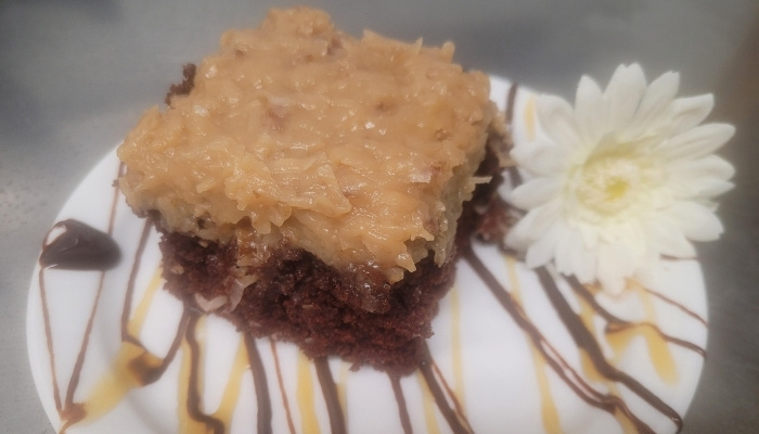Chocolate cake with coconut topping at JC's Country Diner Restaurant, Elwood Utah.