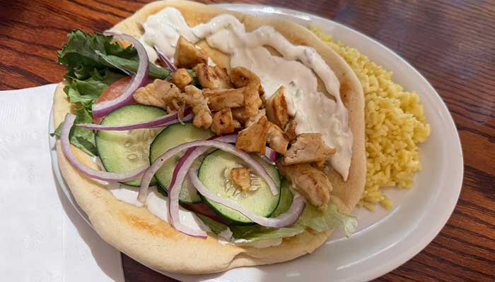 JC's Country Diner Restaurant Elwood Utah: Pita with chicken, veggies, sauce, and yellow rice.