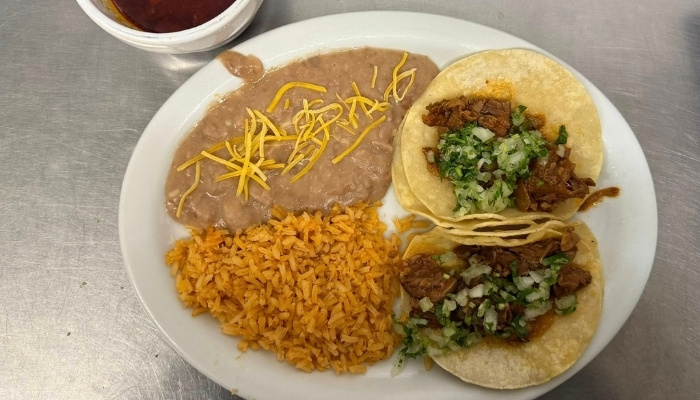 Enjoy two tacos with rice, cheesy refried beans & salsa at JC's Country Diner Restaurant Elwood Utah.